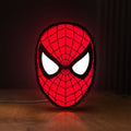 Front view of Spider-Man LED lightbox sign glowing on a wooden desk