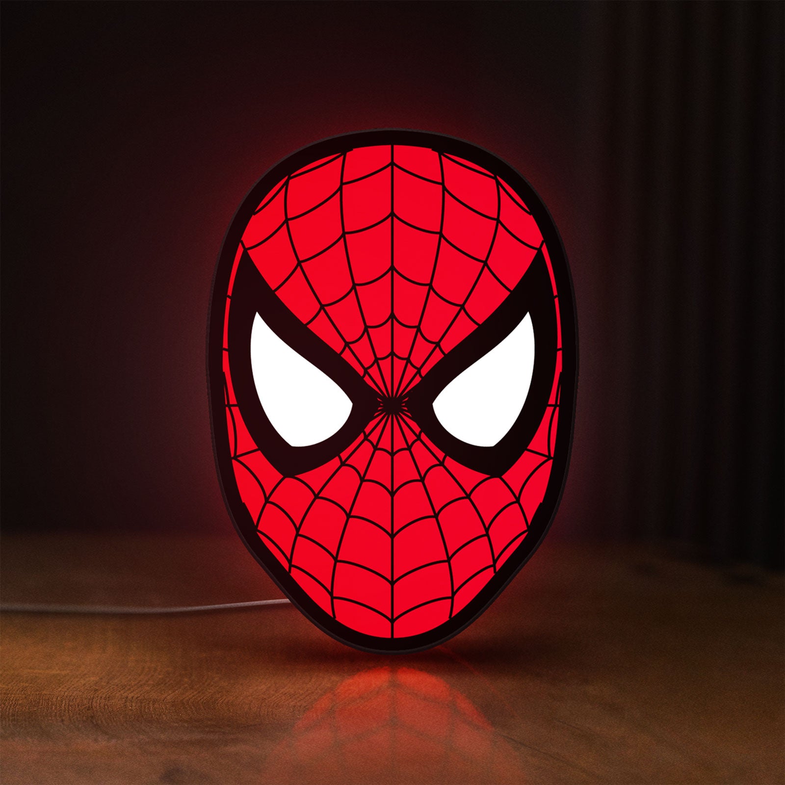 Front view of Spider-Man LED lightbox sign glowing on a wooden desk