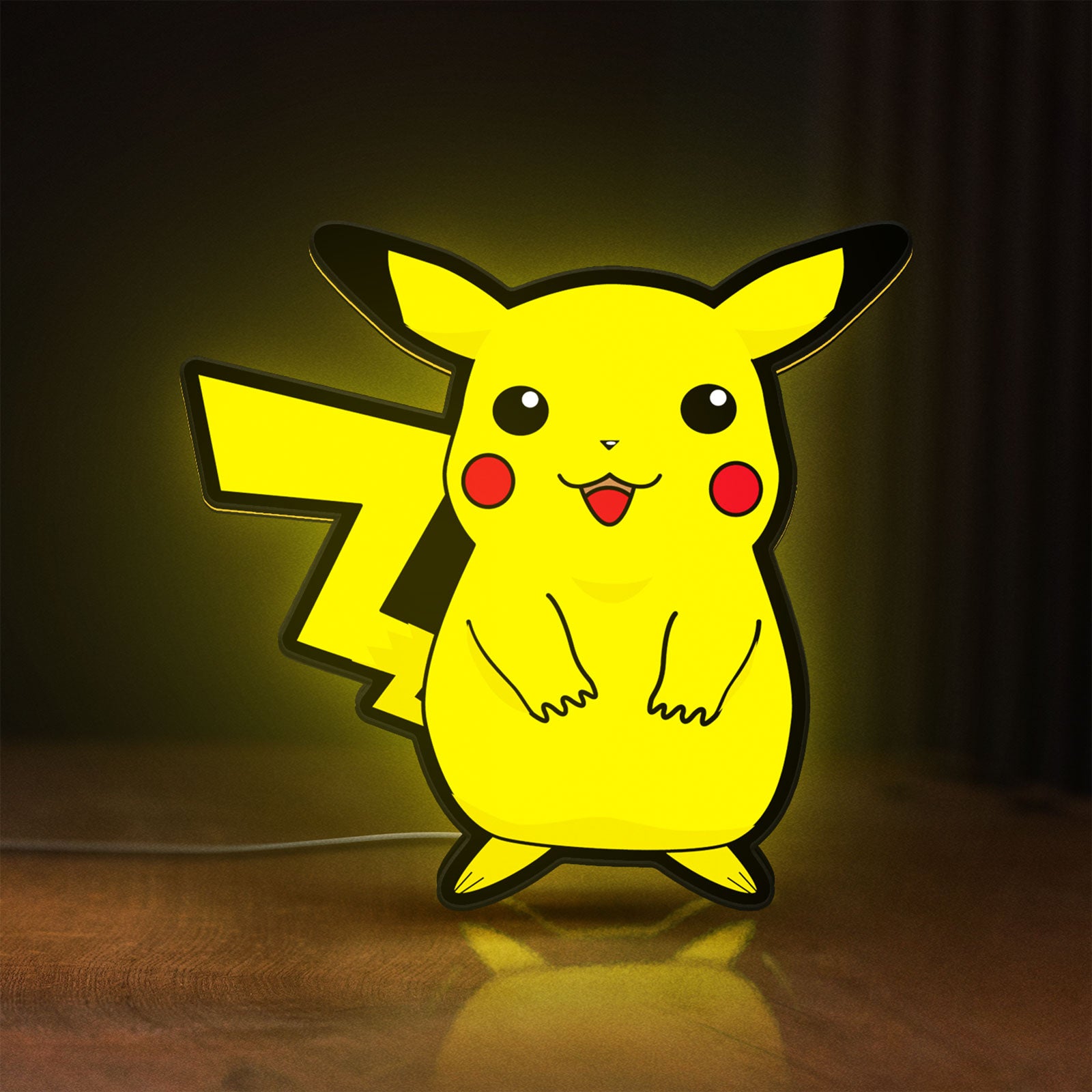 Front view of Pokemon LED lightbox sign glowing on a wooden desk