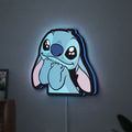 Lilo & Stitch LED lightbox hanging on a wall with blue glow