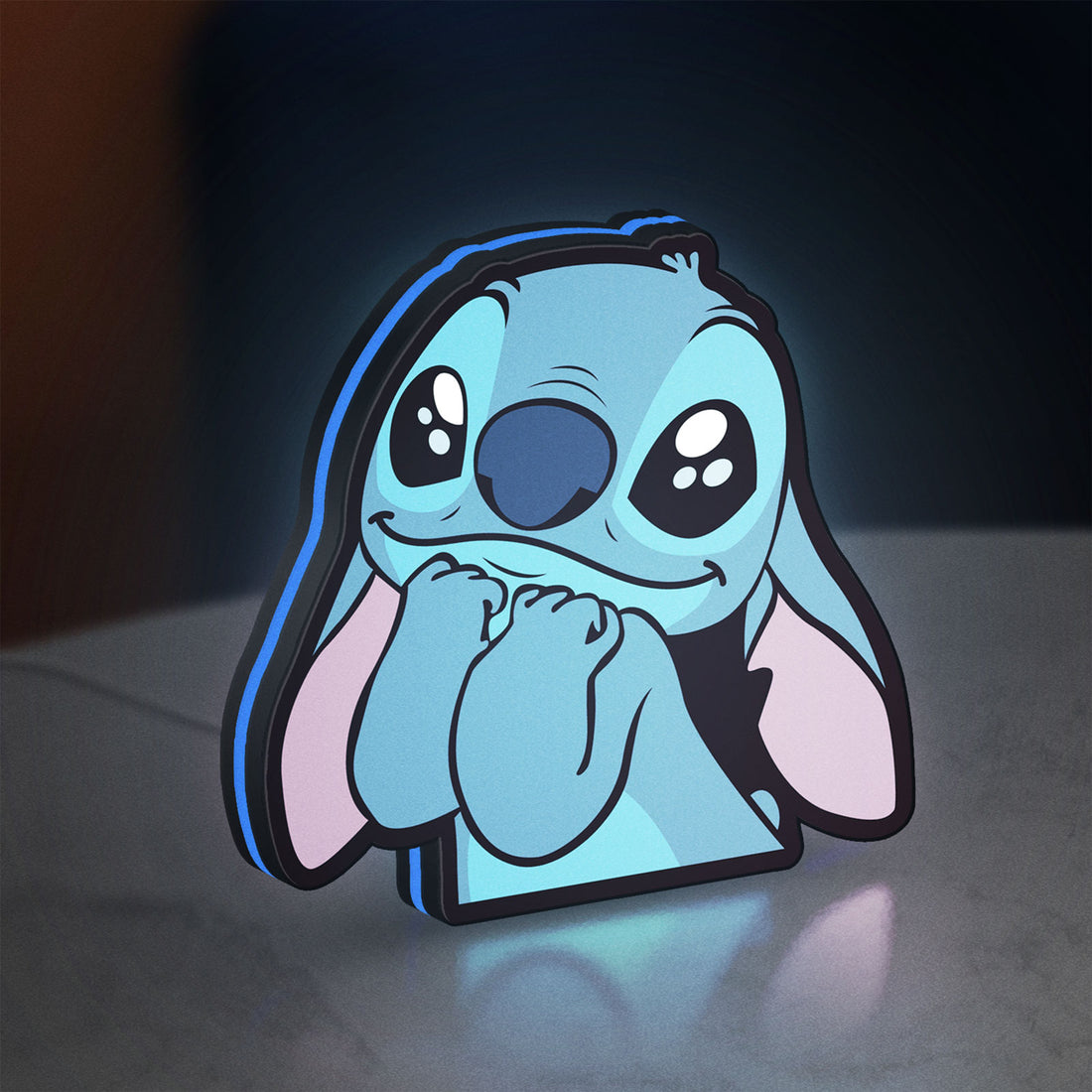 Lilo & Stitch LED lightbox hanging on a wall with blue glow