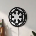 Unlit Galactic Empire LED lightbox mounted on a wall in daylight
