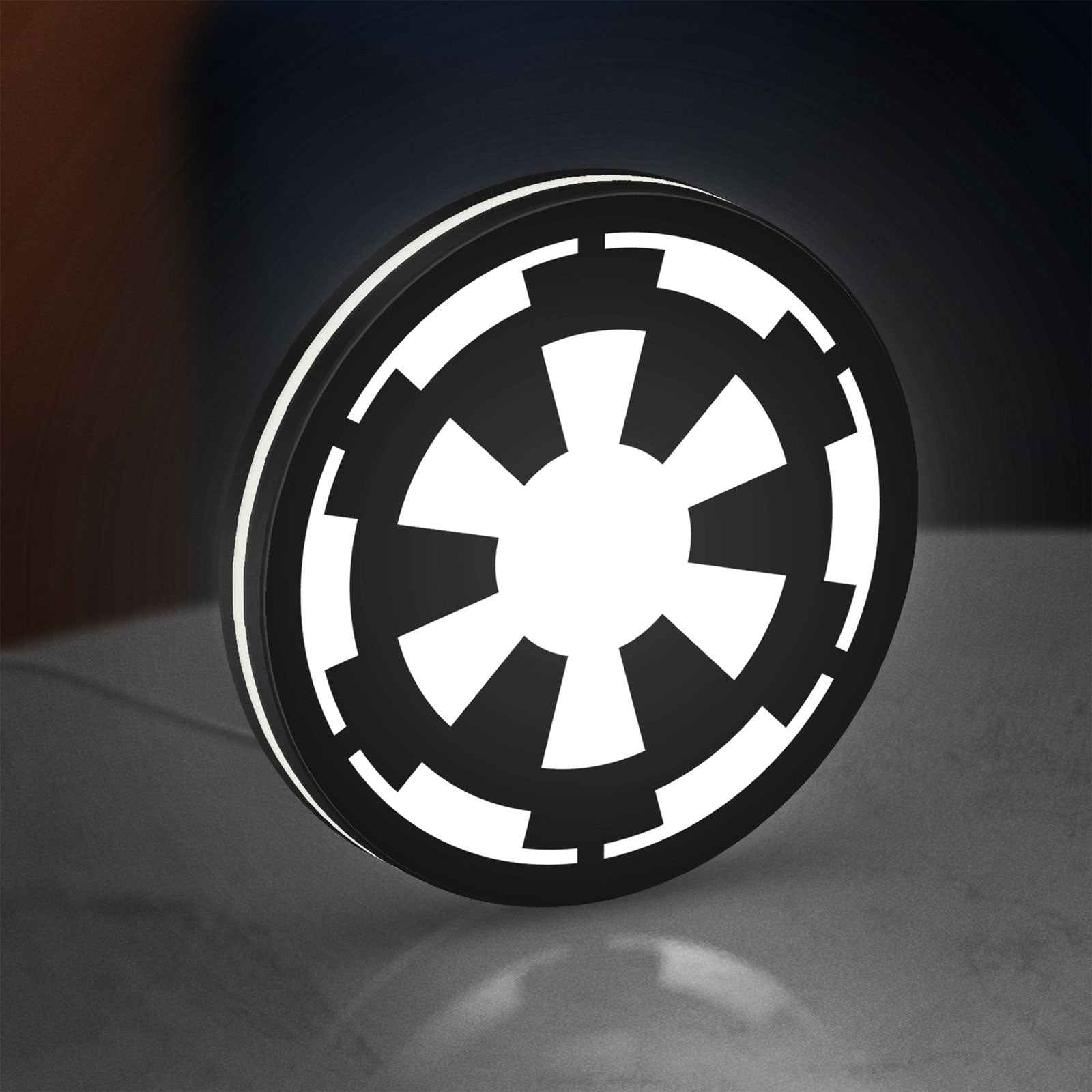 Galactic Empire LED lightbox standing on a desk from an angled side view with white glow