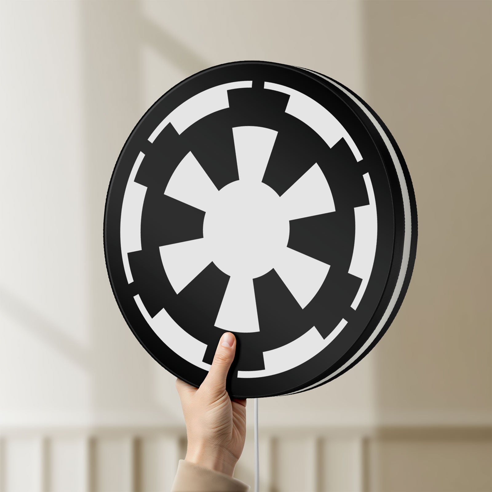 Unlit Galactic Empire LED lightbox held by hand to show size and details