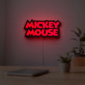 Mickey Mouse LED lightbox hanging on a room wall with soft red light