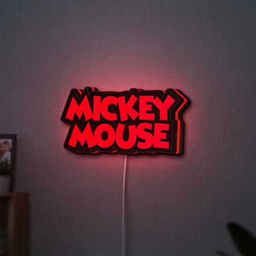 Mickey Mouse LED lightbox hanging on a wall with red glow