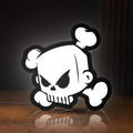 Front view of Ken Block Skull LED lightbox sign glowing on a wooden desk