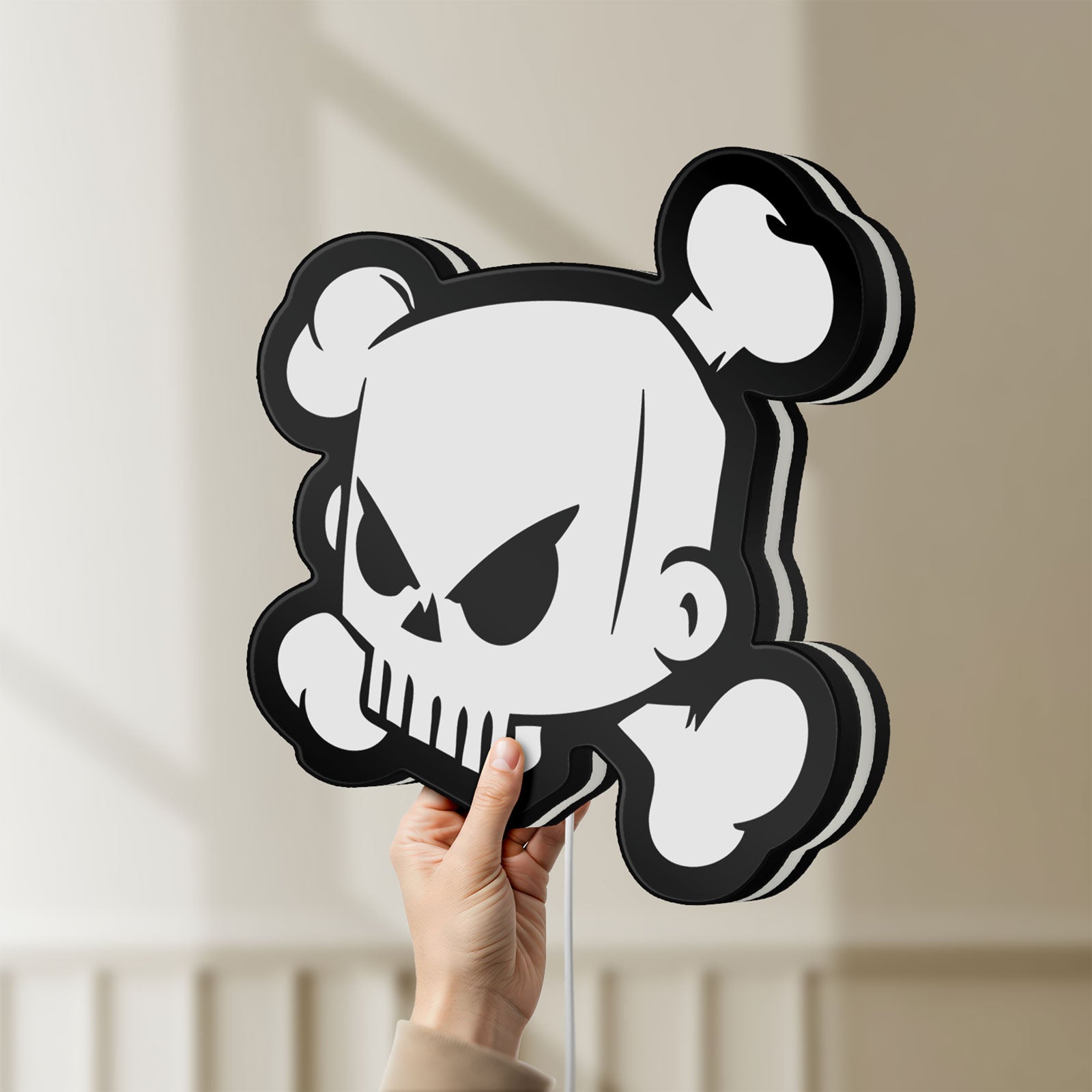 Unlit Ken Block Skull LED lightbox held by hand to show size and details