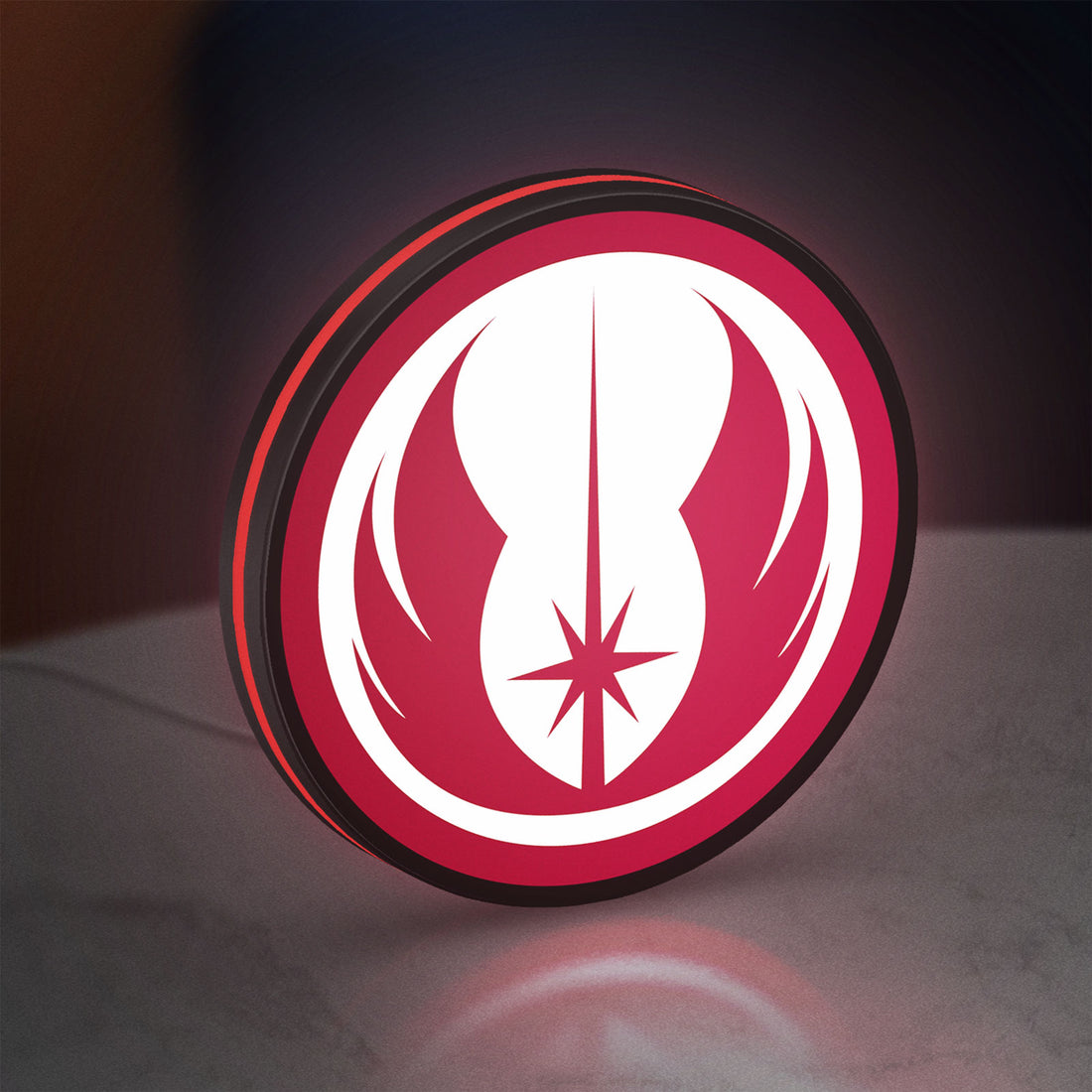 Jedi Order LED lightbox hanging on a wall with red glow
