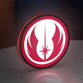 Jedi Order LED lightbox standing on a desk from an angled side view with red glow
