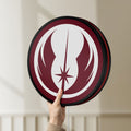 Unlit Jedi Order LED lightbox held by hand to show size and details
