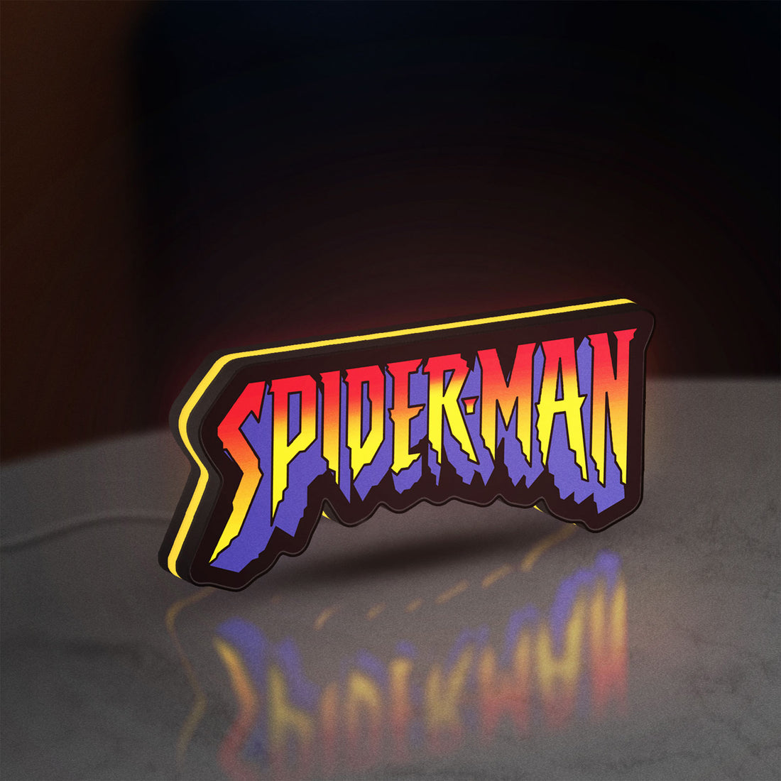 Spider-Man LED lightbox hanging on a wall with yellow glow