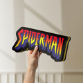 Unlit Spider-Man LED lightbox held by hand to show size and details