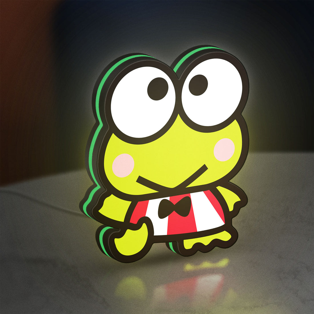 Keroppi LED lightbox hanging on a wall with green glow
