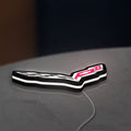 Corvette LED lightbox lying flat on a desk with white glow