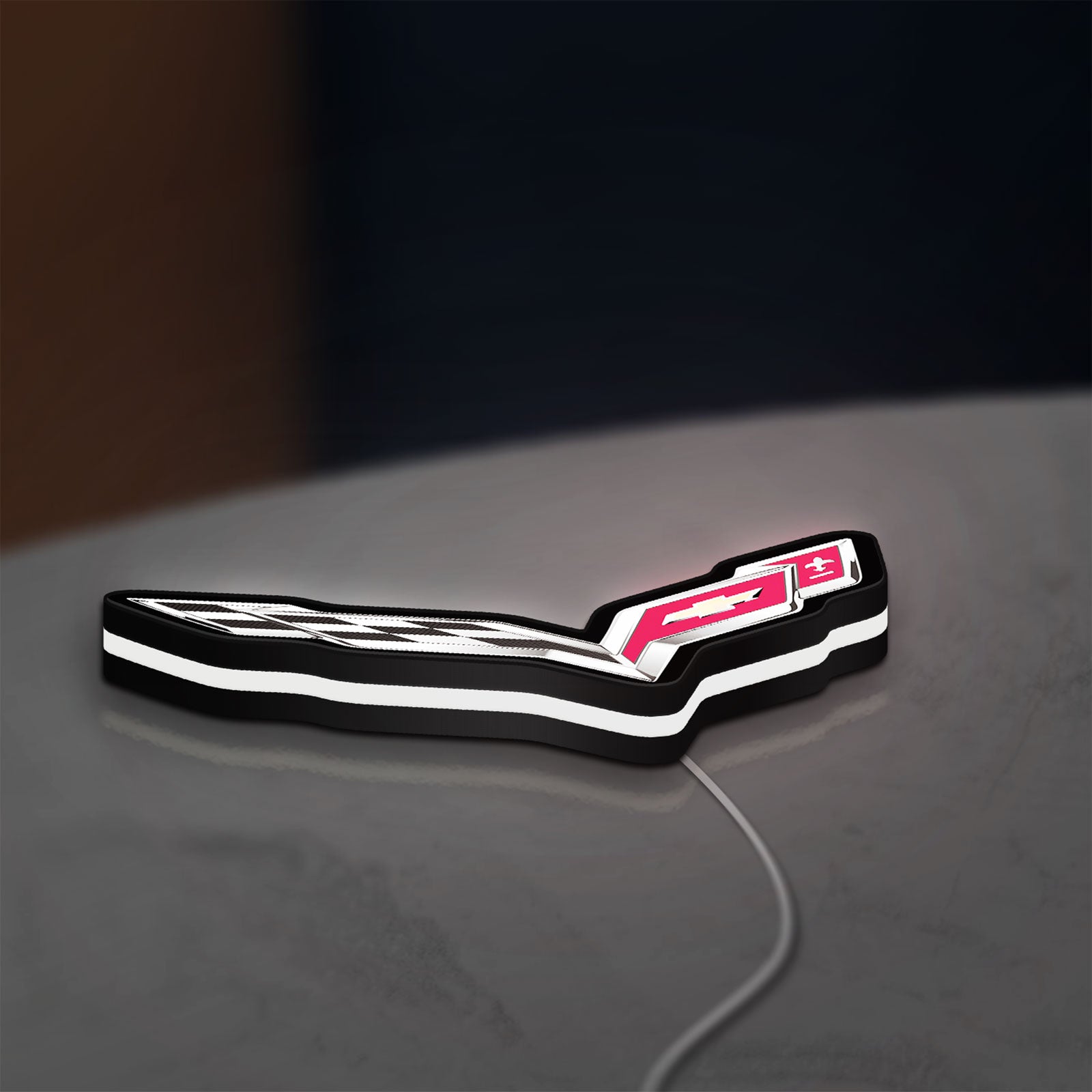 Corvette LED lightbox lying flat on a desk with white glow