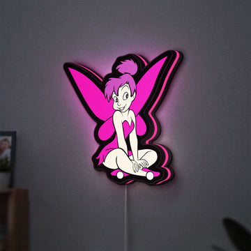 Tinkerbell LED lightbox hanging on a wall with pink glow