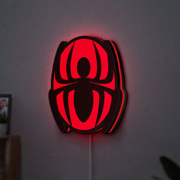Spider-Man LED lightbox hanging on a wall with red glow