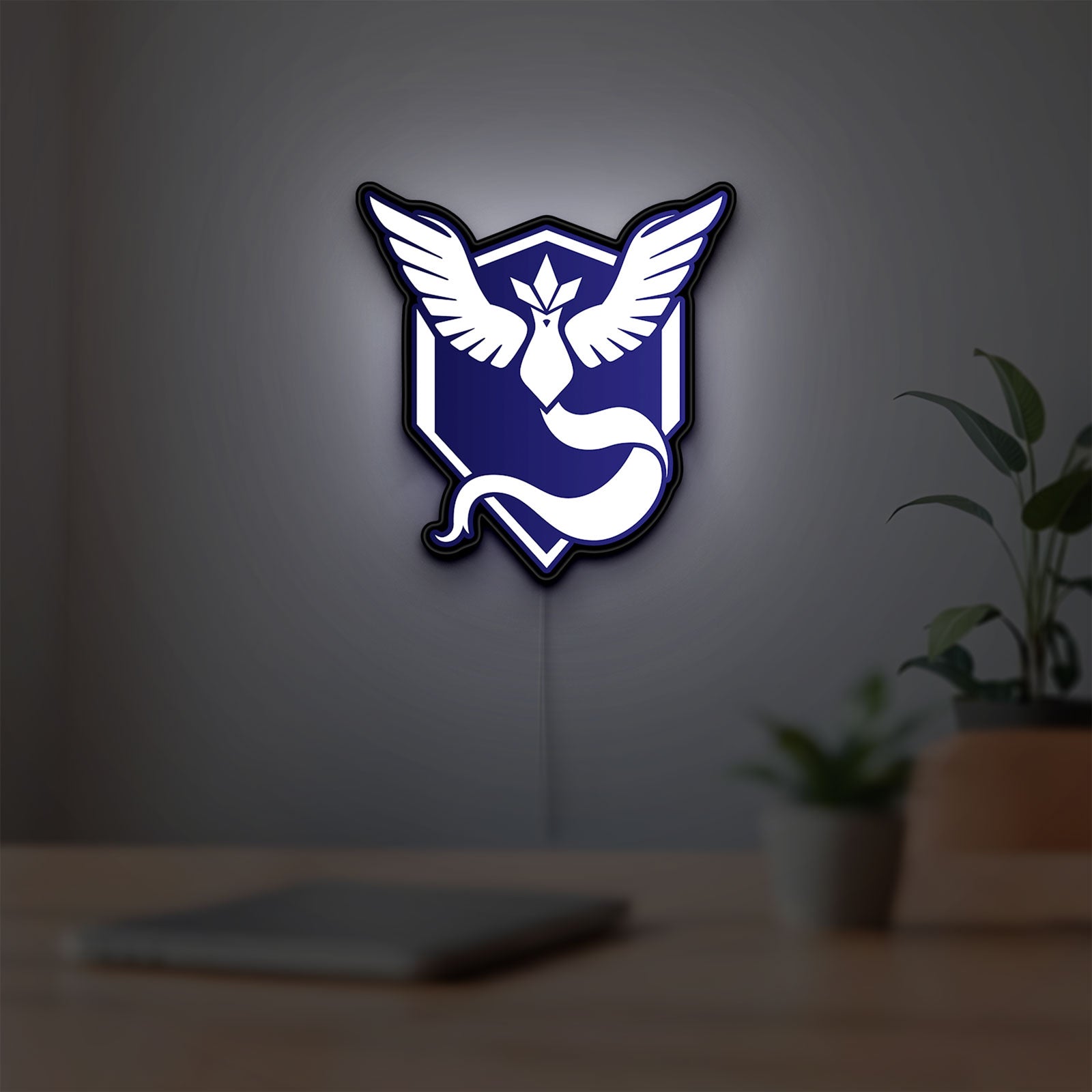 Pokemon GO Team Mystic LED lightbox hanging on a room wall with soft white light