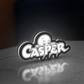 Casper LED lightbox standing on a desk from an angled side view with white glow