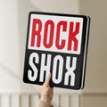 Unlit Rock Shox LED lightbox held by hand to show size and details