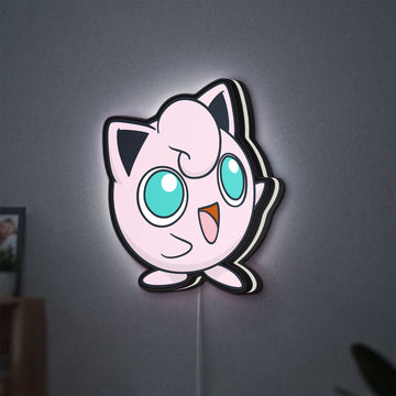 Jigglypuff LED lightbox hanging on a wall with white glow