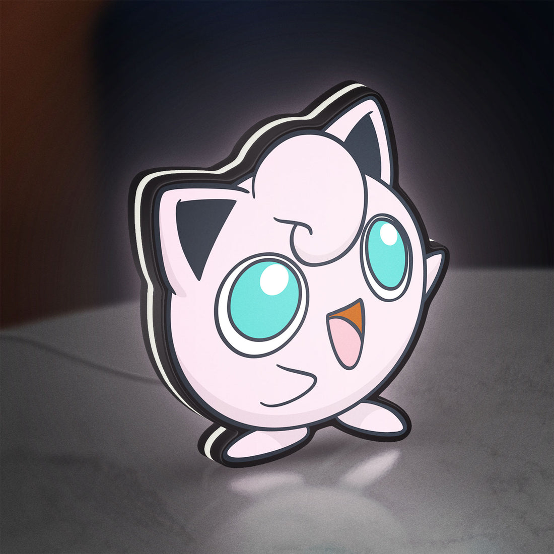 Jigglypuff LED lightbox hanging on a wall with white glow