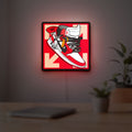 Nike Jordan Air Shoe LED lightbox hanging on a room wall with soft red light