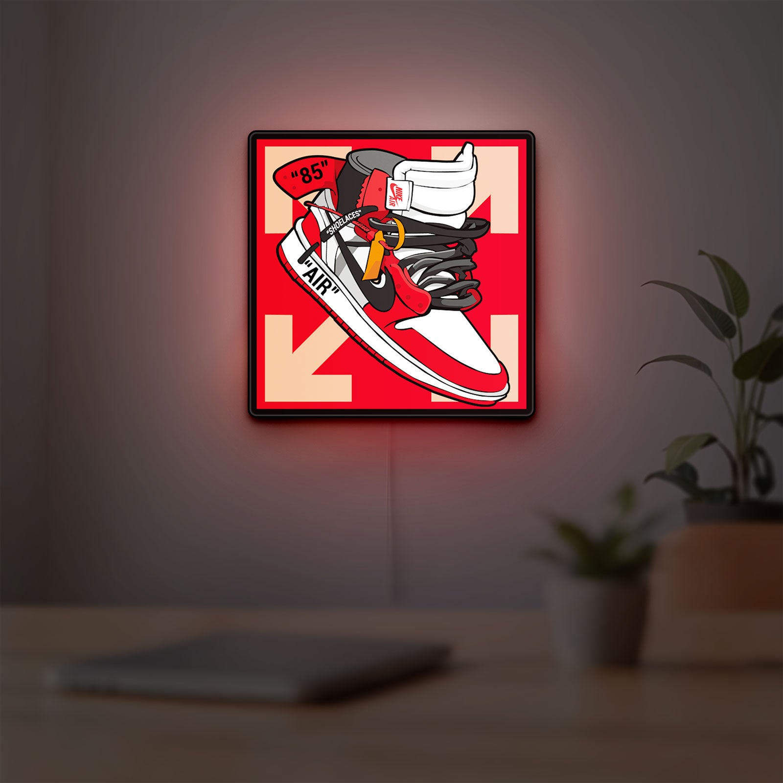 Nike Jordan Air Shoe LED lightbox hanging on a room wall with soft red light