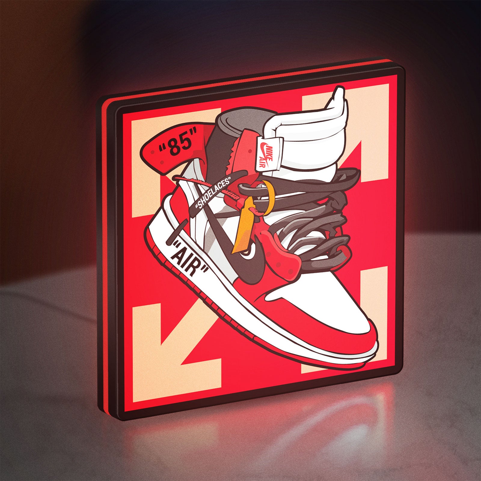 Nike Jordan Air Shoe LED lightbox standing on a desk from an angled side view with red glow