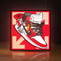Front view of Nike Jordan Air Shoe LED lightbox sign glowing on a wooden desk