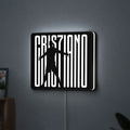 CR 7 Juventus LED lightbox hanging on a wall with white glow