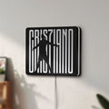 Unlit CR 7 Juventus LED lightbox mounted on a wall in daylight