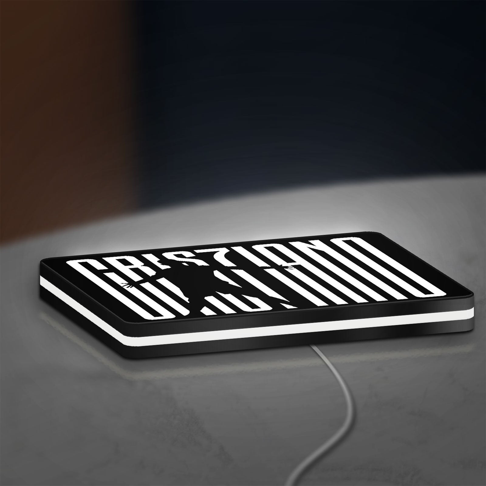 CR 7 Juventus LED lightbox lying flat on a desk with white glow