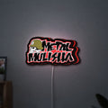 Metal Mulisha LED lightbox hanging on a wall with red glow