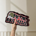Unlit Metal Mulisha LED lightbox held by hand to show size and details