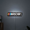 NASCAR LED lightbox hanging on a wall with white glow