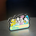 Disney Babies LED lightbox standing on a desk from an angled side view with white glow