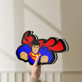 Unlit Superman S Shield LED lightbox held by hand to show size and details