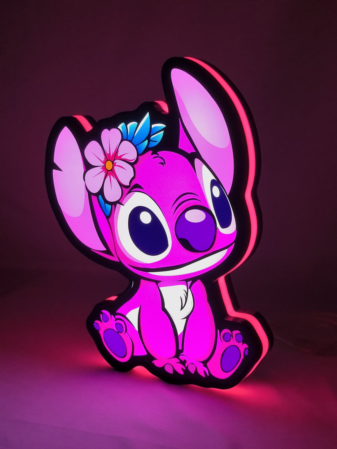 30cm Pink Stitch Glowing Wall Art - Illuminated front view standing, unique wall art for desk and room decor