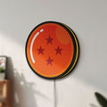 Unlit 4 Star Dragon Ball LED lightbox mounted on a wall in daylight