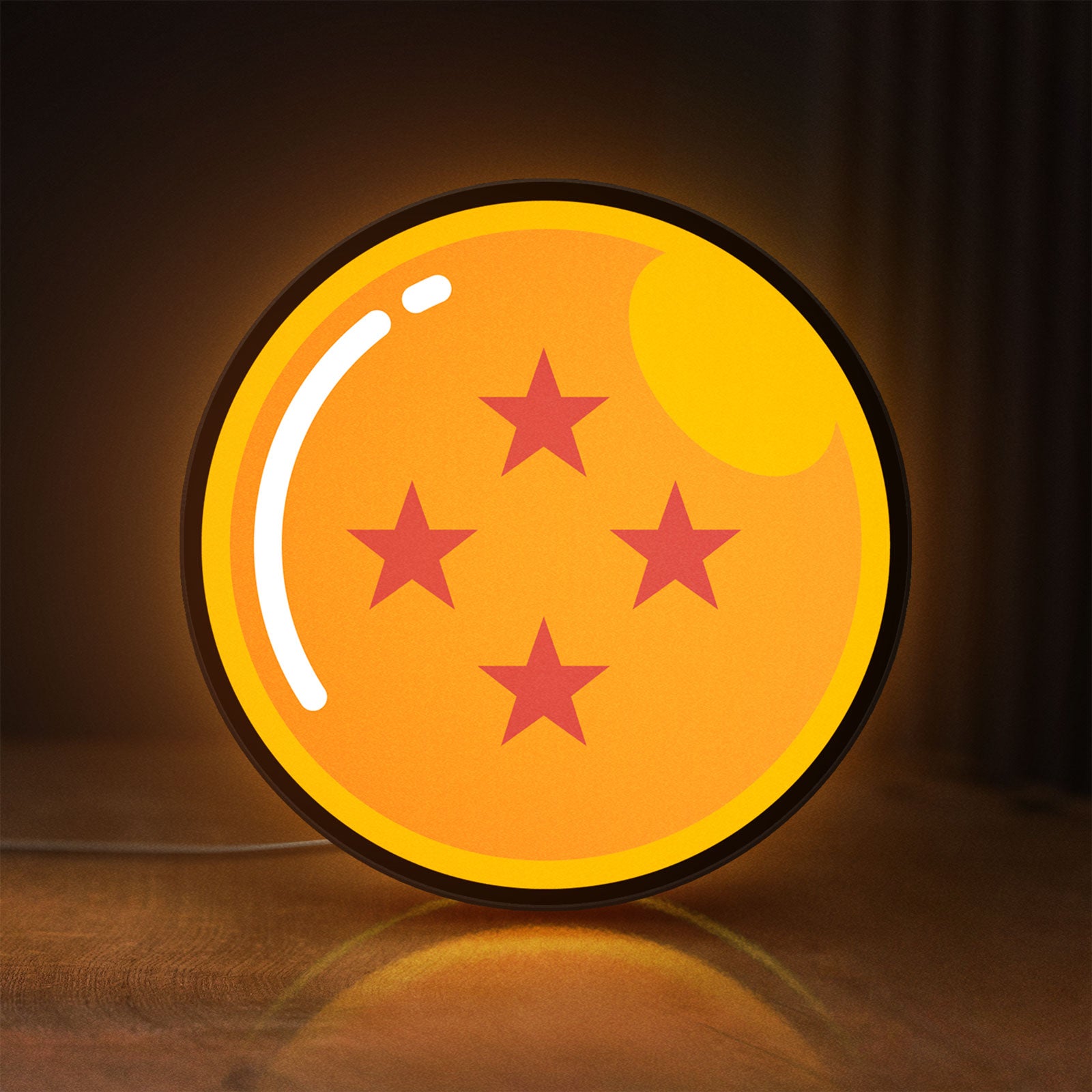 Front view of 4 Star Dragon Ball LED lightbox sign glowing on a wooden desk