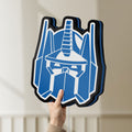 Unlit Optimus Prime LED lightbox held by hand to show size and details