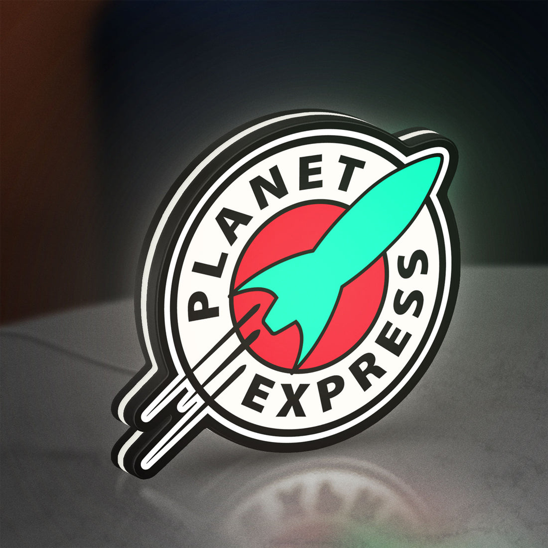 Planet Express LED lightbox hanging on a wall with white glow