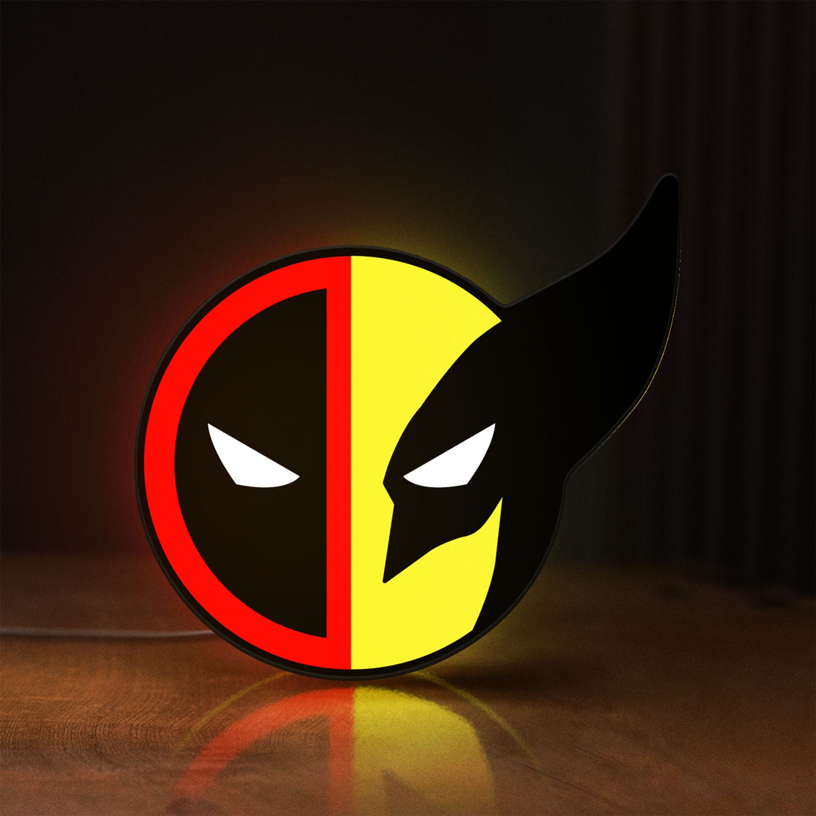 Front view of Deadpool & Wolverine Icon LED lightbox sign glowing on a wooden desk