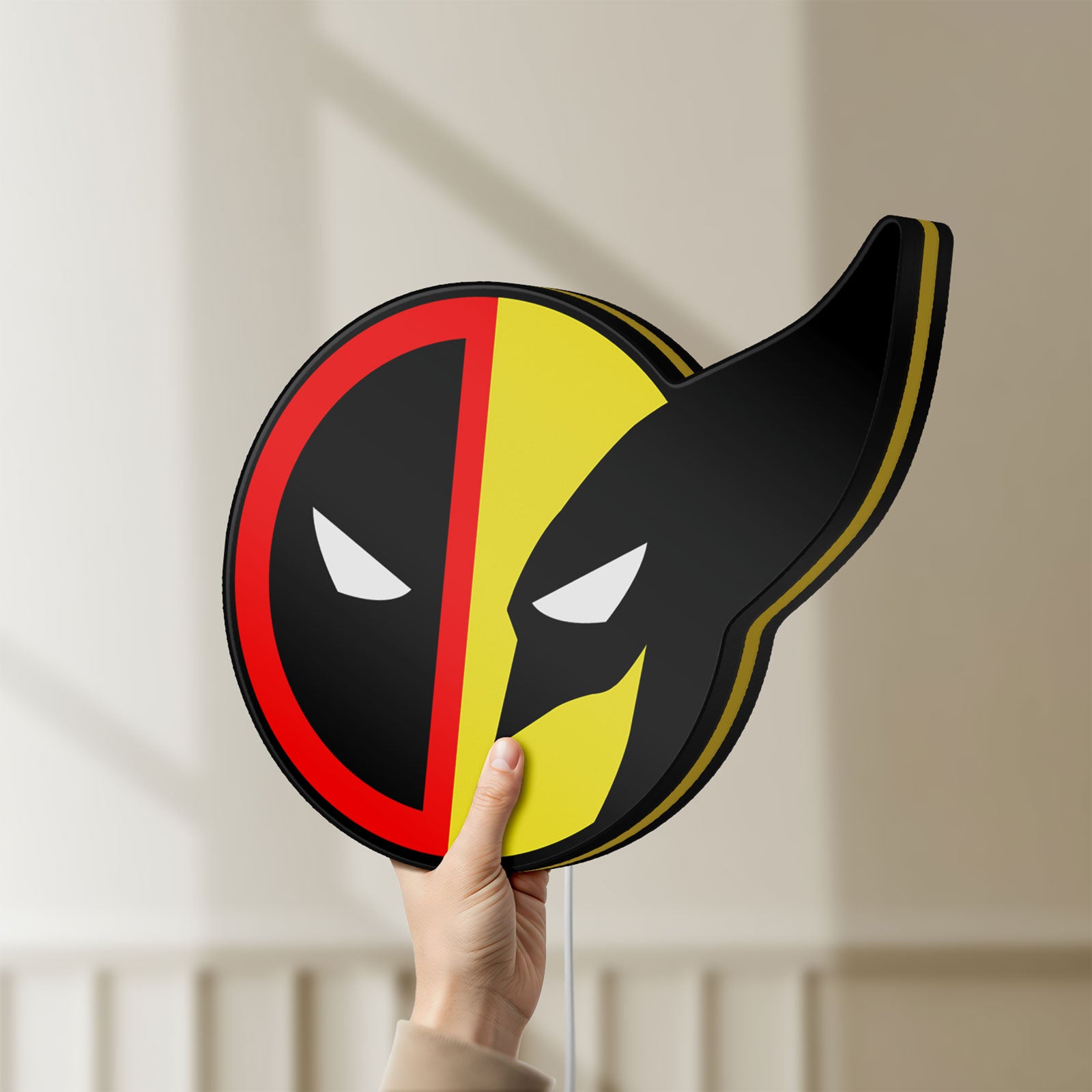 Unlit Deadpool & Wolverine Icon LED lightbox held by hand to show size and details