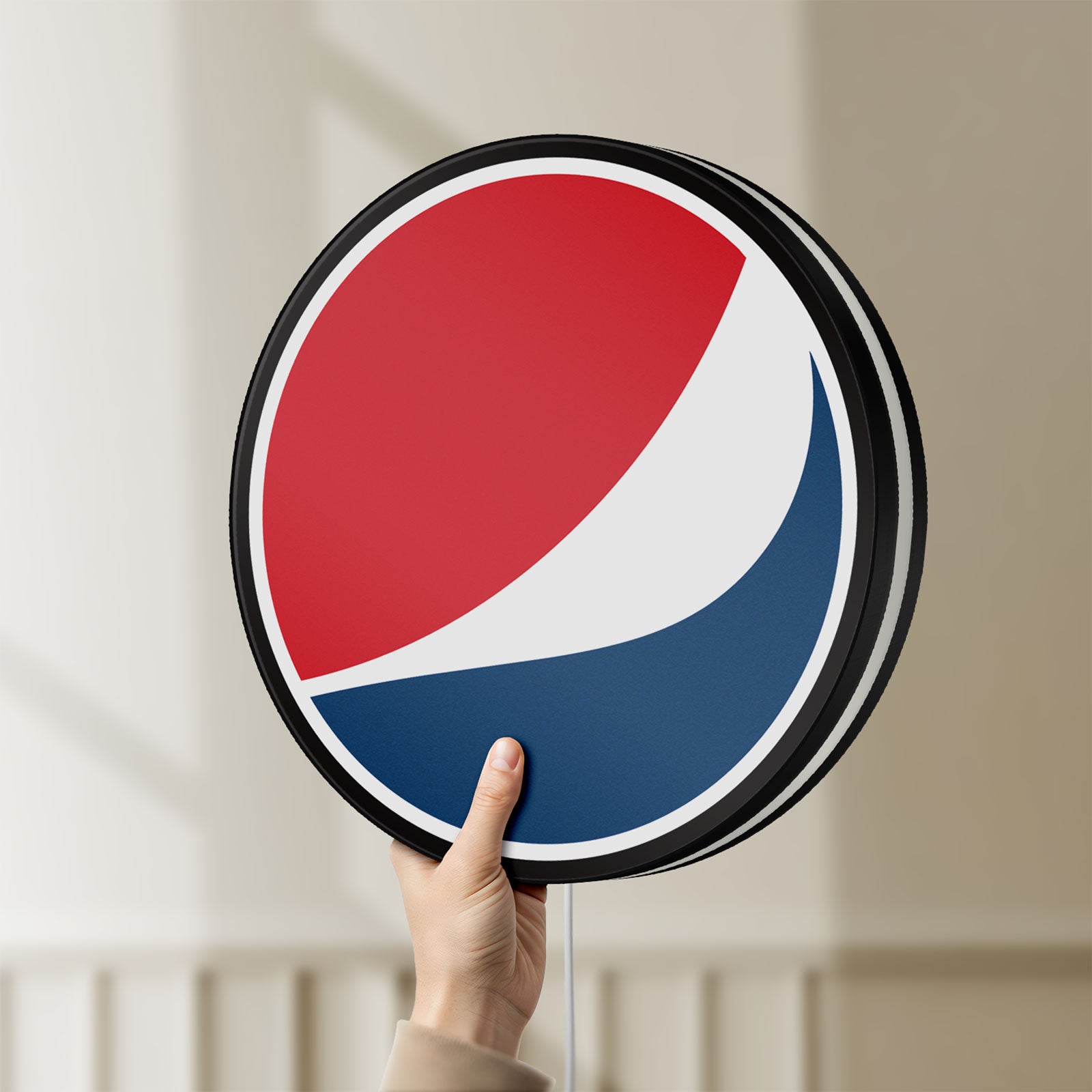 Unlit Pepsi LED lightbox held by hand to show size and details