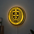 TVA LED lightbox hanging on a wall with yellow glow