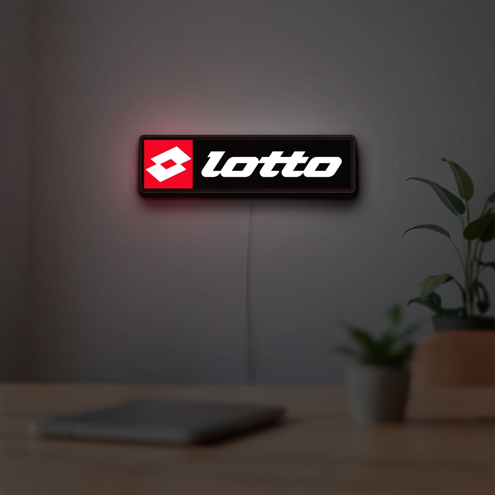 Lotto LED lightbox hanging on a room wall with soft red light