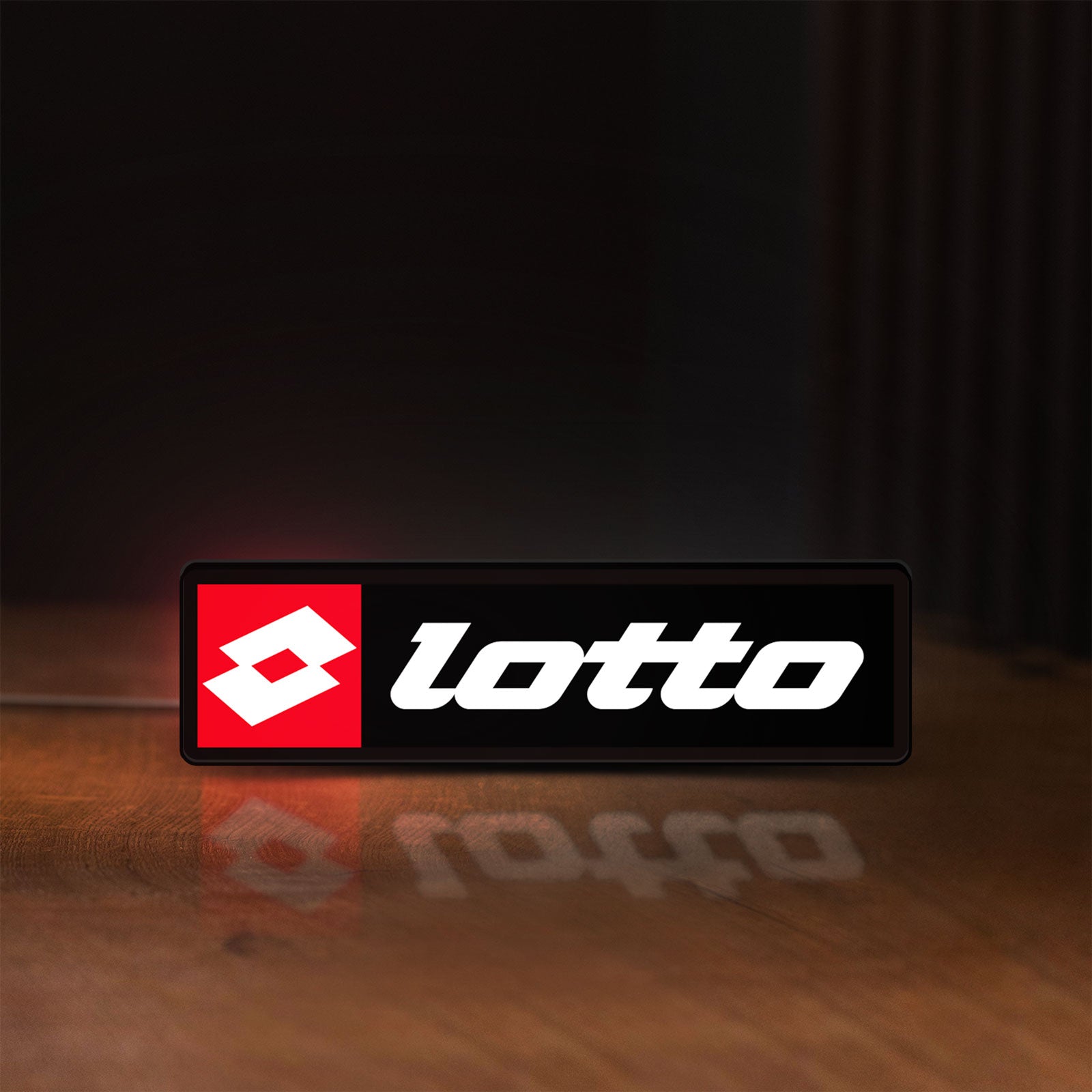 Front view of Lotto LED lightbox sign glowing on a wooden desk